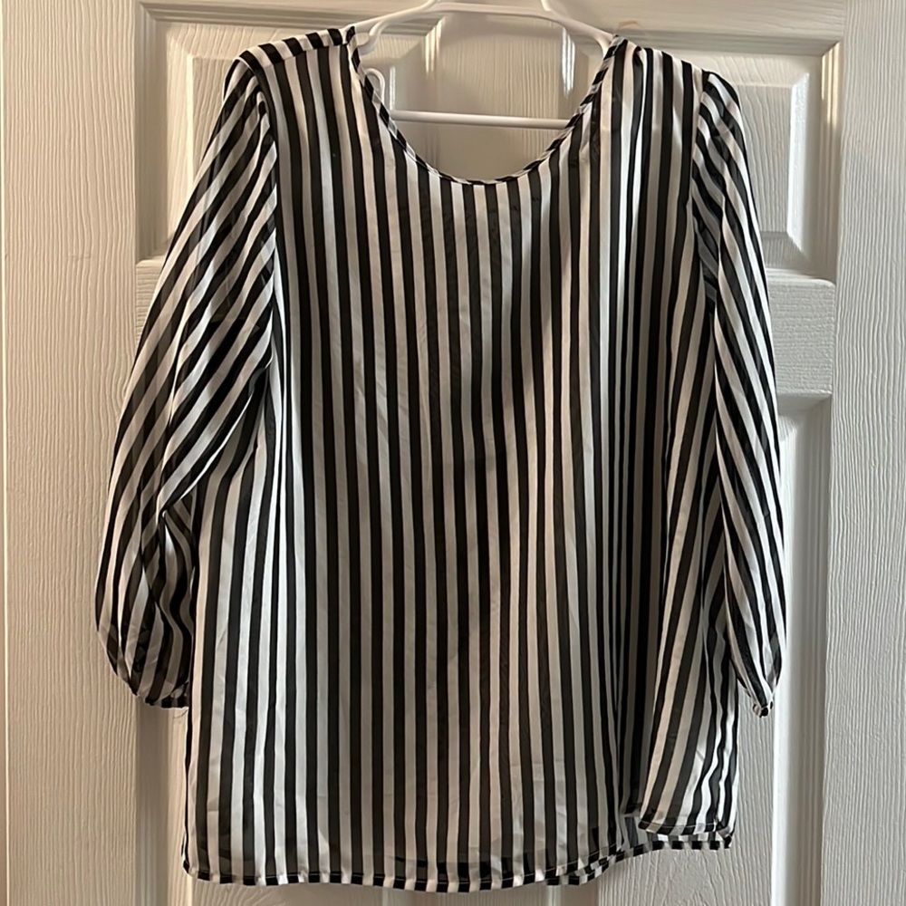 Black and white vertical stripe top with a bow in the back from Cato